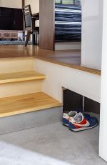 靴の収納スペースを設けた勝手口は奥様のアイデア